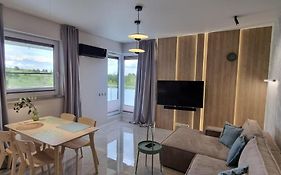 62m2 Apartament PREMIUM Łąki i Pola, ELEKTRYCZNE ROLETY, KLIMATYZACJA, GARAŻ, ŁADOWARKA AUT ELEKTRYCZNYCH